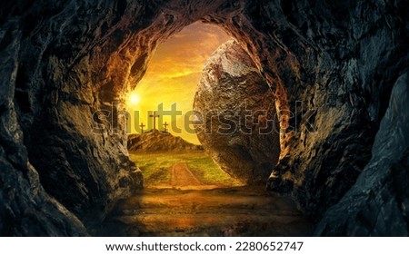 Empty tomb of Jesus with crosses in the background. Royalty-Free Stock Photo #2280652747