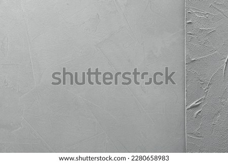 Light gray textured surfaces as background, top view
