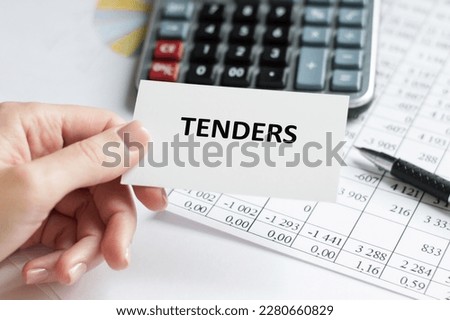 Business card with text Tenders with, glasses, pen and calculator. Financial concept