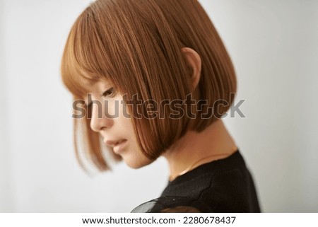 Teenage young Teenage young woman with short hair Royalty-Free Stock Photo #2280678437