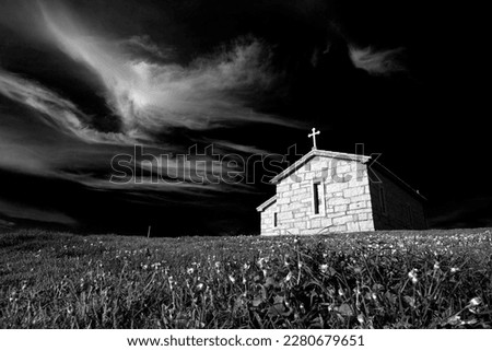 Little chapel of Saint Paio with interesting clouds in the north of Portugal, near Porto. Converted to Black and White.
