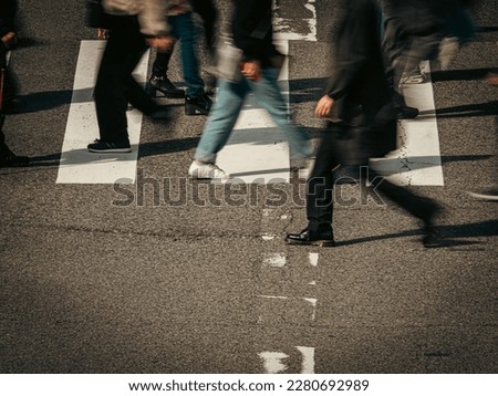 People crowd walking on a pedestrian crossing, City of Osaka in Japan, Business or work background, Blurred image Royalty-Free Stock Photo #2280692989