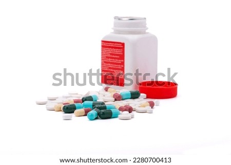 colorful pills with capsules and pills Medicine bottles isolated on white background Hospital Pharmacy Dispensing Concept Pharmacies and clinics health care