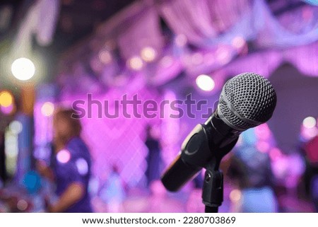 Retro microphone on stage in a pub or American Bar restaurant during a night show