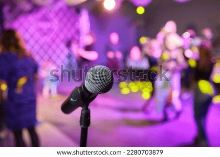 Retro microphone on stage in a pub or American Bar restaurant during a night show