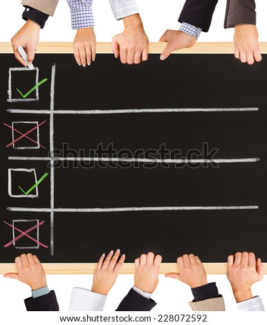 Photo of business hands holding blackboard and writing Positive and Negative symbols