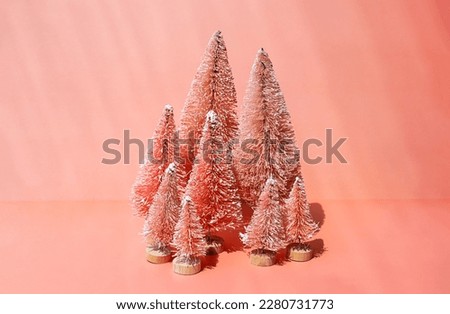 Bottle brush trees composition for winter holidays. Miniature artificial Christmas trees collection. Royalty-Free Stock Photo #2280731773