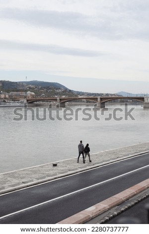 Tourists from behind in Budapest, sightseeing