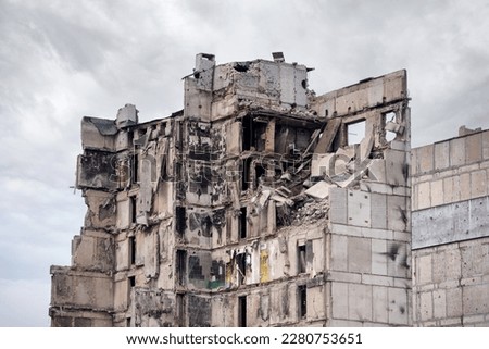 destroyed and burned houses in the city during the war in Ukraine Royalty-Free Stock Photo #2280753651