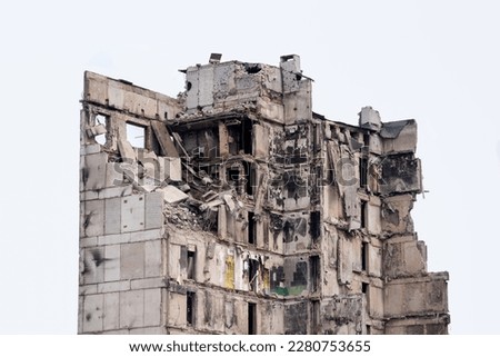 destroyed and burned houses in the city during the war in Ukraine Royalty-Free Stock Photo #2280753655