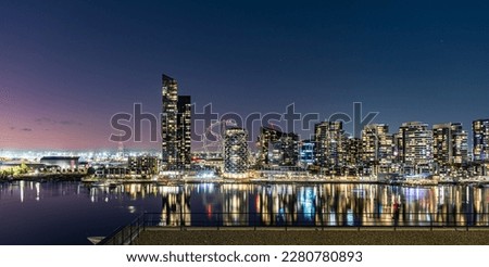 Melbourne Docklands city buildings at night Royalty-Free Stock Photo #2280780893