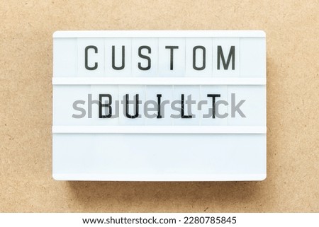Lightbox with word custom built on wood background