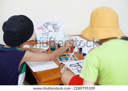 Students are studying art subject, drawing and painting. Concept, art activity. Children enjoy and concentrate on their favorite activity. Education. Learning by doing  imagine              