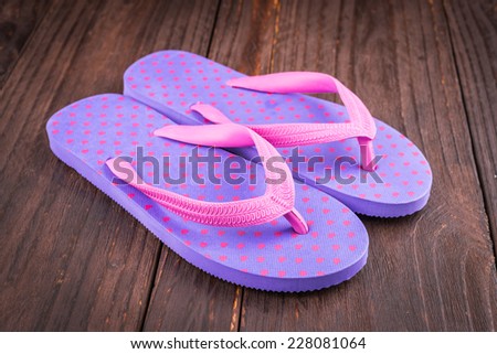 Slipper on wooden background - vintage effect style pictures