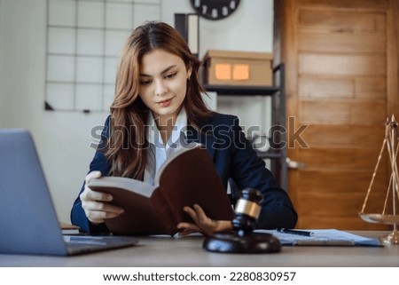 lawyer student is sitting at the reading table. Royalty-Free Stock Photo #2280830957