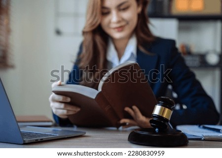 lawyer student is sitting at the reading table.