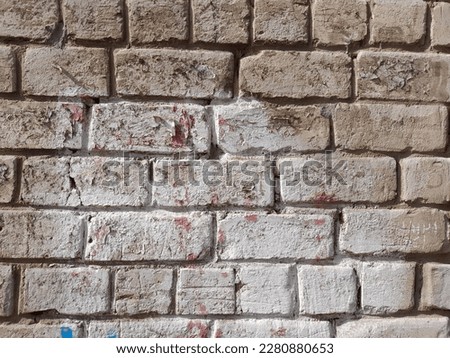 Brick wall texture background, pattern. Brickwork, stonework, rough surface, old house, cracks, close-up structure.