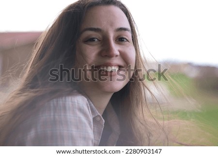 Beautiful girl with long hair.Happy woman.the wind blows on long hair.
Emotions of happiness.Natural emotions.Portrait of a woman.happy girl.Woman laughs beautifully.Close-up portrait.Sensual.Gentle. Royalty-Free Stock Photo #2280903147