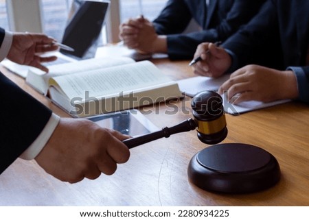 wooden judge gavel on table as symbol of justice for use in legal cases judicial system and civil rights and social justice concept with judge. concept of legislation to judge lawsuits with justice. Royalty-Free Stock Photo #2280934225