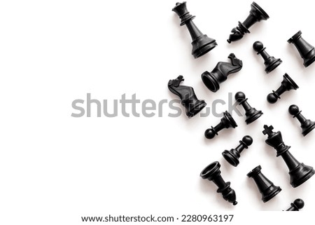 Business leadership concept. Black and white chess pieces, top view. Royalty-Free Stock Photo #2280963197