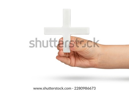 White plus symbol in hand. The concept of social security, and health insurance. Personal development, growth concept. Mathematical symbol plus of white color in a hand on a white isolated background
