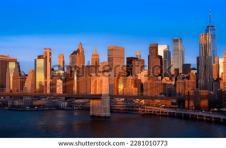 Brooklyn Bridge and Downtown Manhattan at Sunrise. New York City, USA