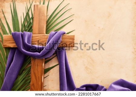 Palm sunday background. Cross and palm on vintage background. Royalty-Free Stock Photo #2281017667