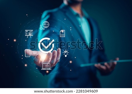 Hand shows sign of top service Quality assurance, Guarantee, Standards, ISO certification and standardization concept, satisfaction, service experience, show the standards of products and services. Royalty-Free Stock Photo #2281049609