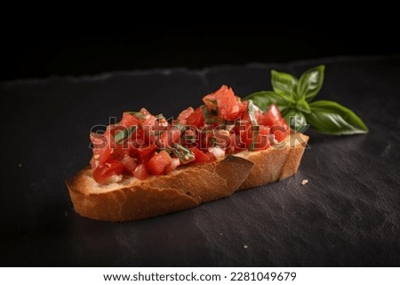 Bruschetta (tomato toast with basil) Royalty-Free Stock Photo #2281049679