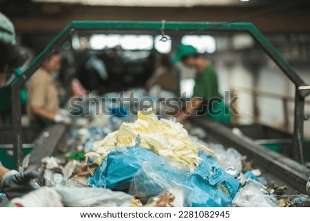 Sustainable Waste Management: Sorting Plastic Waste at Recycling Centers for Environmental Preservation and Resource Recovery Royalty-Free Stock Photo #2281082945