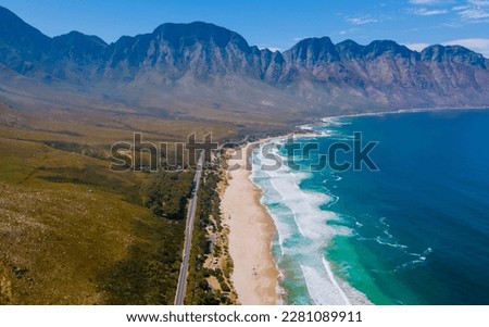 Kogelbay beach Western Cape South Africa, Kogelbay Rugged Coast Line with spectacular mountains. Garden route, drone aerial view at the road and beach Royalty-Free Stock Photo #2281089911