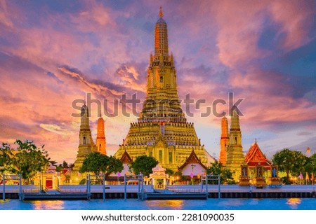 Wat Arun temple Bangkok during sunset in Thailand. Chao praya river Royalty-Free Stock Photo #2281090035