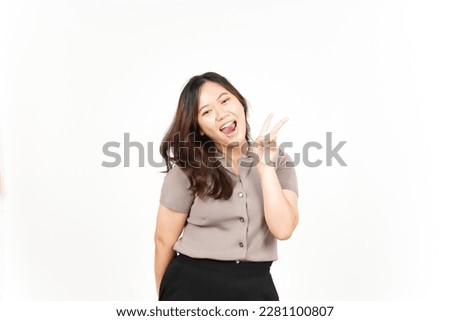 Showing Peace Sign and Smiling Of Beautiful Asian Woman Isolated On White Background