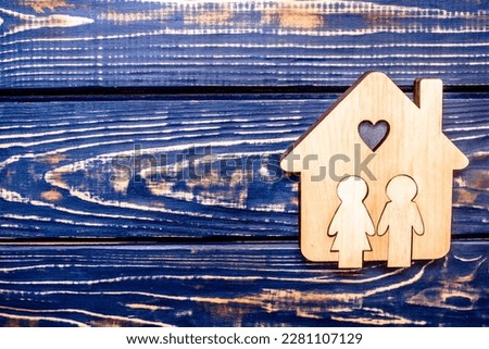Symbol of home and family on a brown background 