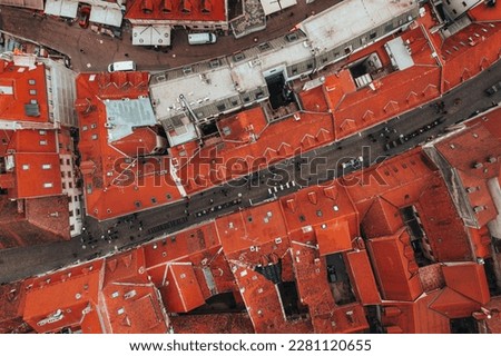  Bird's Eye View of the Streets of Zagreb, Croatia's Capital City with our Aerial Photography. Our Top-Down Shot captures the vibrant energy and colorful beauty of the city's streets, architecture