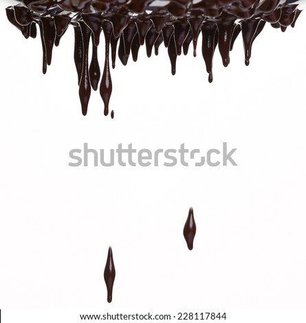 Hot chocolate stream isolated on white 