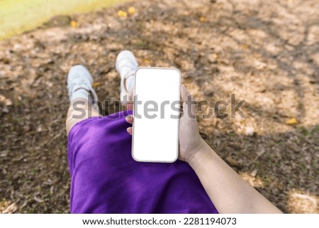 Close up of women's hands holding cell telephone blank copy space screen. smart phone with technology
