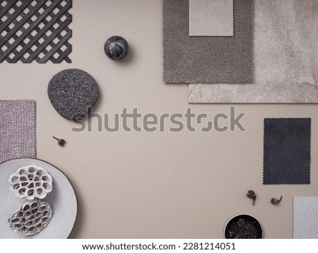 Classic  flat lay composition in grey and beige color palette with textile and paint samples, lamella panels and tiles. Architect and interior designer moodboard. Top view. Copy space. 