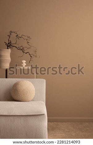 Minimalist composition of aesthetic living room interior with copy space, modular sofa, brown sideboard, vase with branch, round pillow and personal accessories. Home decor. Template.  Royalty-Free Stock Photo #2281214093