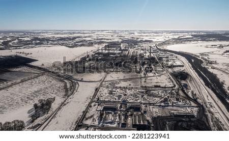 Factory from above. Modern plant from aerial view. Factory metallurgical production. Environmental disaster around the plant. Not environmentally friendly production. Nature pollution