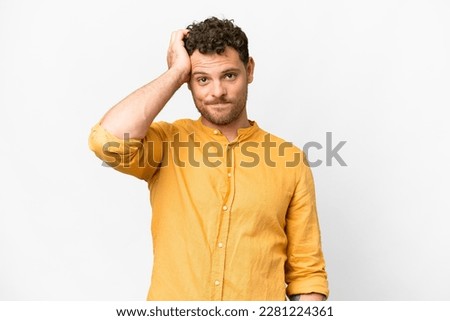 Brazilian man over isolated white background with an expression of frustration and not understanding Royalty-Free Stock Photo #2281224361