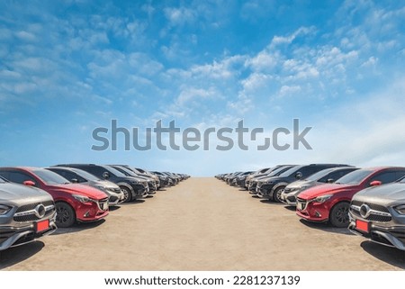 Lot of used car for sales in stock with sky and clouds Royalty-Free Stock Photo #2281237139