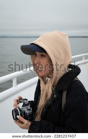 Portrait of an adventurous young girl sailing the sea