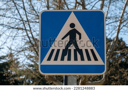 Traffic sign indicates zebra or pedestrian crossing Royalty-Free Stock Photo #2281248883