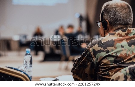 Photo of a soldier leading a seminar for professional training of military personnel Royalty-Free Stock Photo #2281257249