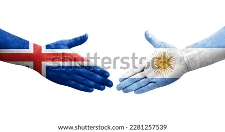 Handshake between Argentina and Iceland flags painted on hands, isolated transparent image.