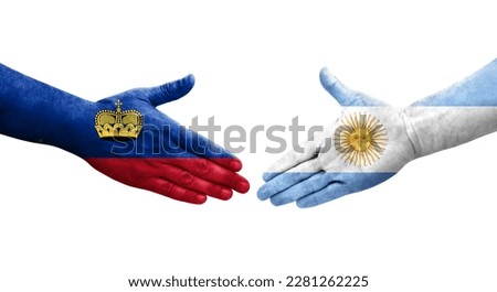 Handshake between Argentina and Liechtenstein flags painted on hands, isolated transparent image.