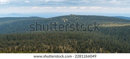 View to Vozka hill with rock formation from Keprnik hill summit in Jeseniky mountains in Czech republic Royalty-Free Stock Photo #2281266049