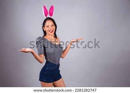 Brazilian woman, northeastern, wearing bunny ears, photo for Easter. welcome.