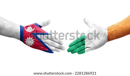Handshake between Ireland and Nepal flags painted on hands, isolated transparent image.